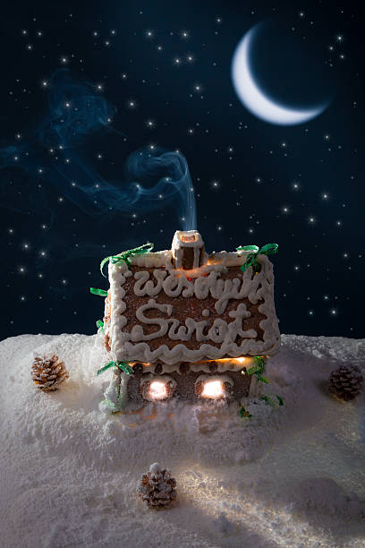 istock Snowy gingerbread cottage at night 178623354