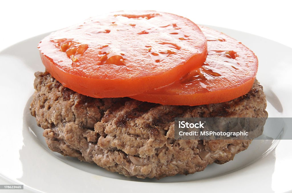 Hamburger patty de rondelles de tomate - Photo de Aliment libre de droits