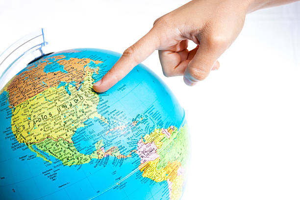 istock Finger pointing to United States in a World Globe 178623725