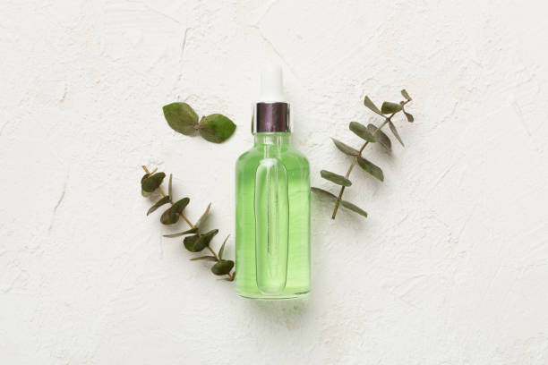 istock Herbal face serum on concrete background, top view 1786238044