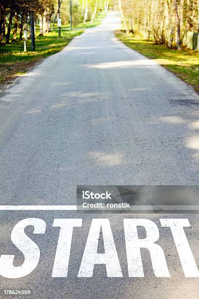 Road With White Start Sign Stock Photo - Download Image Now - Asphalt, Aspirations, Beginnings