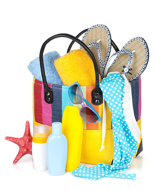 istock Bag with towels, sunglasses, flip-flops and beach items 178625161