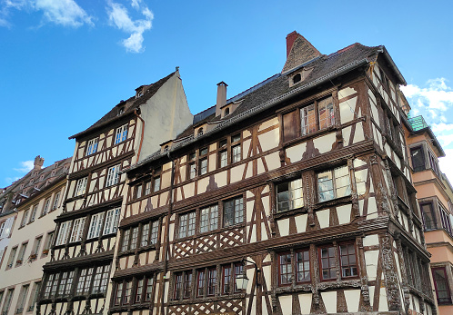 Strasbourg, Alsace, France -October 21, 2023: Historic wooden facade in downtown of Strasbourg at France at winter