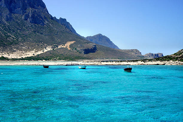 istock Beautiful turquoise sea and boat 178625367