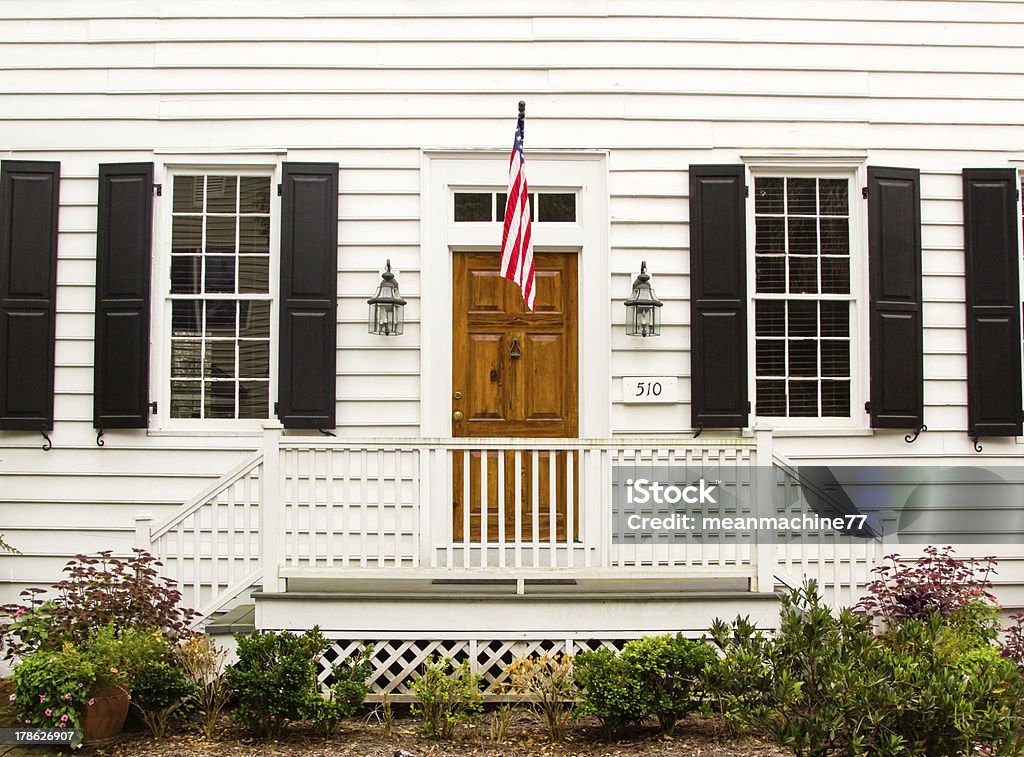 Brown Wooden Door In White Wall With Us Flag Stock Photo - Download Image  Now - American Flag, House, Porch - Istock