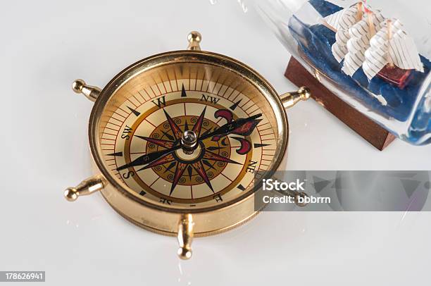 Compass And Ship In A Bottle Stock Photo - Download Image Now - Accessibility, Adventure, Ancient