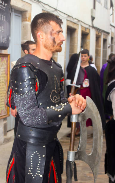 Historical reenactment,  knight character. Medieval Festival ,period clothings, parade along the street .  Mondoñedo medieval historical reenactment. Lugo province, Galicia, Spain.