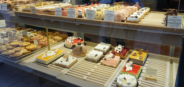 Strasbourg, France - October 21, 2023: Confectionery and baked goods in a store window at Strasbourg, France on October 21, 2023