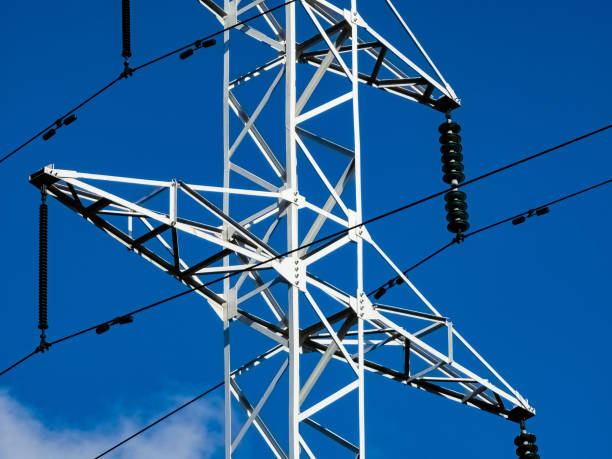 istock High voltage towers on skies background. Transmission line tower. 1786281968