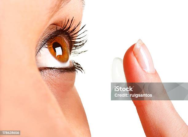 Close Up Of Woman Holding Contact Lens Stock Photo - Download Image Now - Contact Lens, Human Face, Inserting