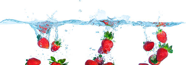 istock Collage Fresh Strawberry Dropped into Water with Splash 178629408