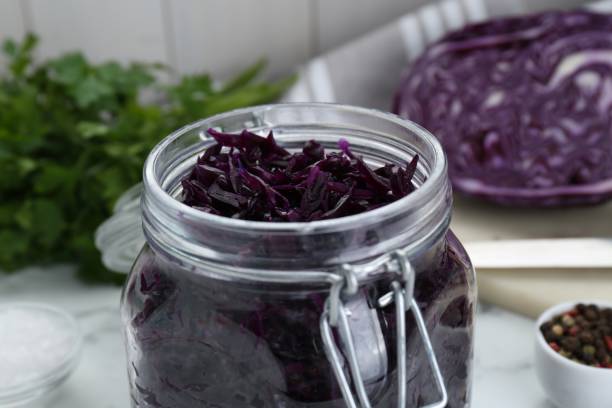 istock Tasty red cabbage sauerkraut on table, closeup 1786294110