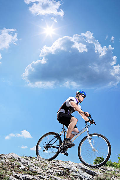 istock Bicyclist riding a bike downhill style 178629751