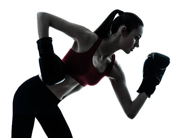 istock beautiful woman exercising boxe 178629810