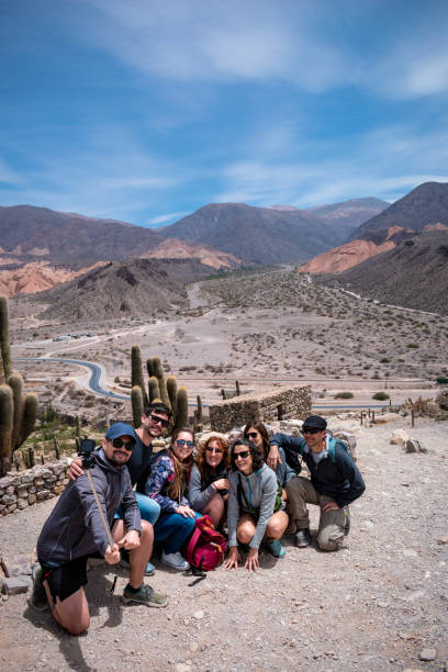 istock Happy people taking a group photo. 1786301641
