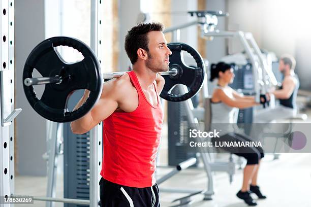 Man With Dumbbell Weight Training Equipment Gym Stock Photo - Download Image Now - Men, Weightlifting, Gym