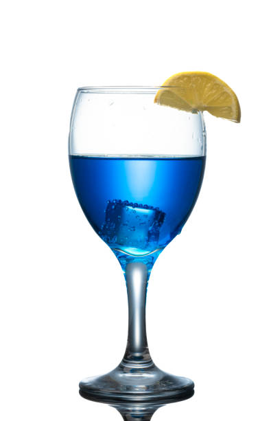 ガラスに入った青色の飲み物 - liqueur color image isolated nobody ストックフォトと画像