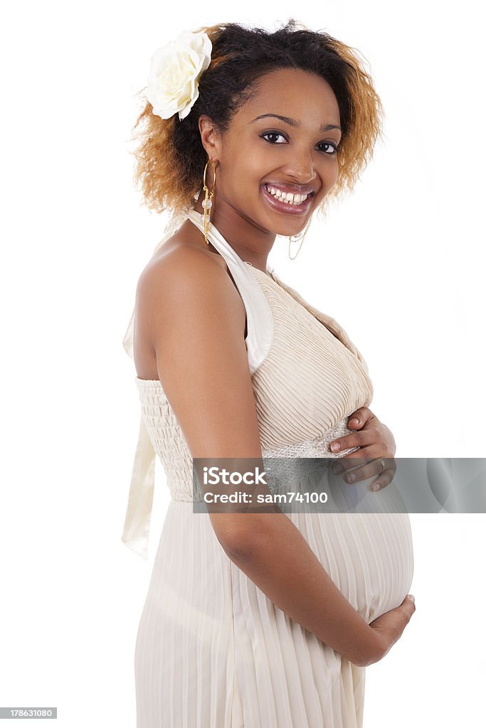 Young beautiful pregnant african woman "Young beautiful pregnant african woman , over white background" Cut Out Stock Photo