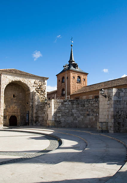 square with church in Alcala de Henares, Madrid, Spain "curved lines that form a path to the entrance of an old church in Alcala de Henares, Madrid, Spain" alcala de henares stock pictures, royalty-free photos & images
