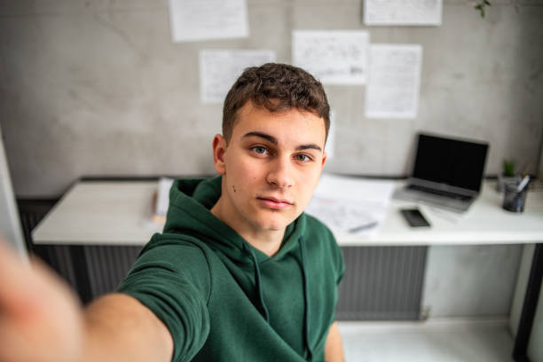 istock Portrait of a young student in his study 1786315589
