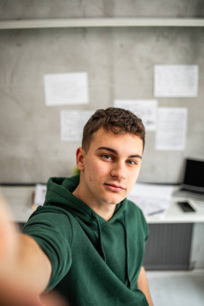 istock Portrait of a young student in his study 1786315604