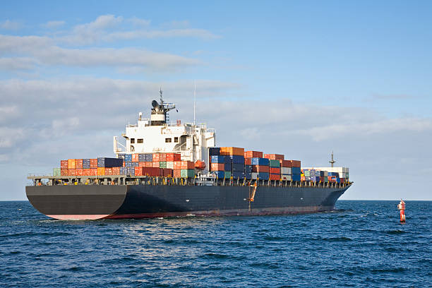 istock Heavily Laden Container Ship Leaving Port 178631710