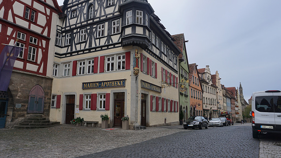 Rothenburg ob der Tauber, Germany - October 20, 2023: Old historical buildings at Rothenburg ob der Tauber - old fortified city in Germany.