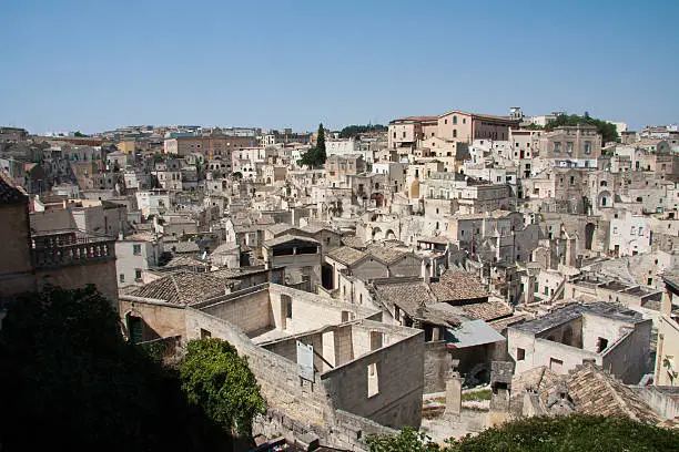 "Cityscape view of Sassi di Matera, toward sasso Barisano, during a summer sunny day."