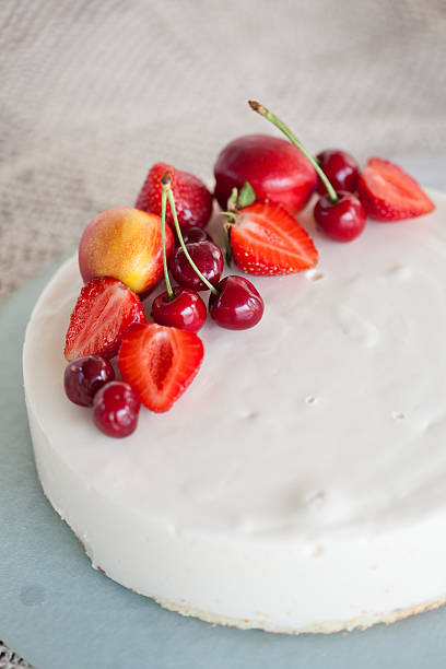 istock White Cream Icing Cake with Fruits 178632231