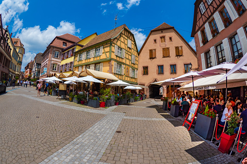 Colorful half timbered building in the streets of the beautiful Alsace village Ribeauvillé