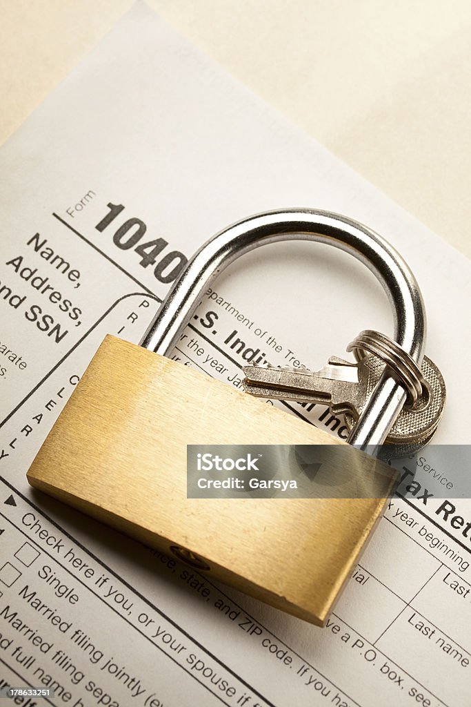 Tax form and key lock Close-up Stock Photo