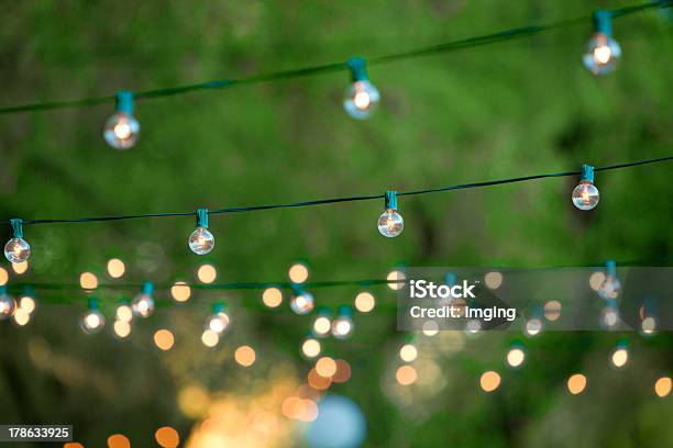 Decorative Christmas Lights For A Back Yard Party Stock Photo - Download Image Now - Summer, Outdoors, Lighting Equipment