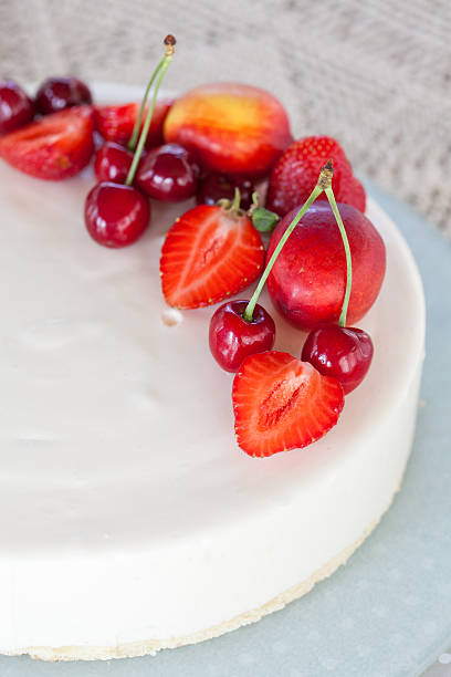 istock White Cream Icing Cake with Fruits 178633926