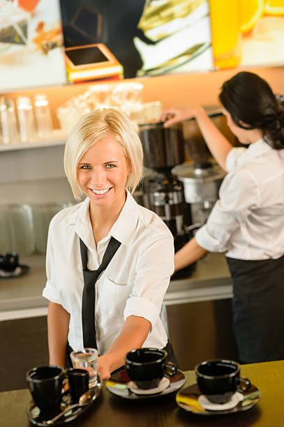 istock Waitress serving coffee cups making espresso woman 178634036