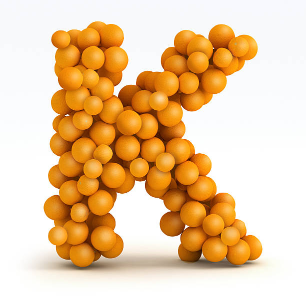 istock Letter K font of orange citrus, white background 178635034