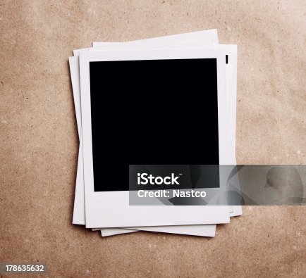 istock Stack of blank vintage photos 178635632