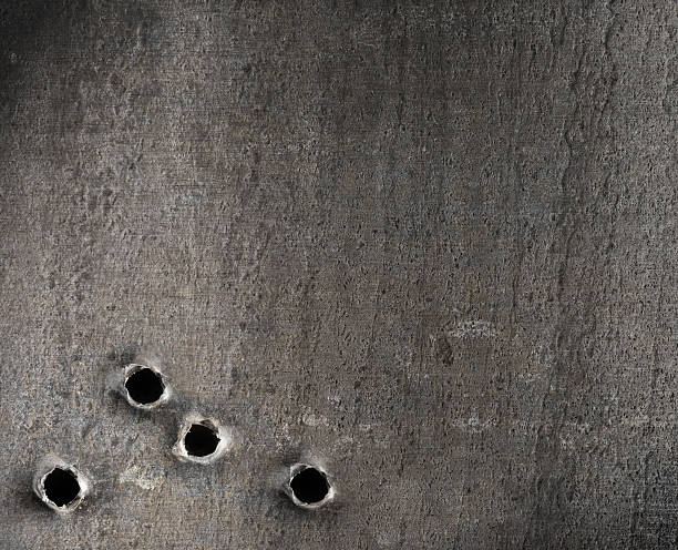 istock metal with bullet holes military background 178635754