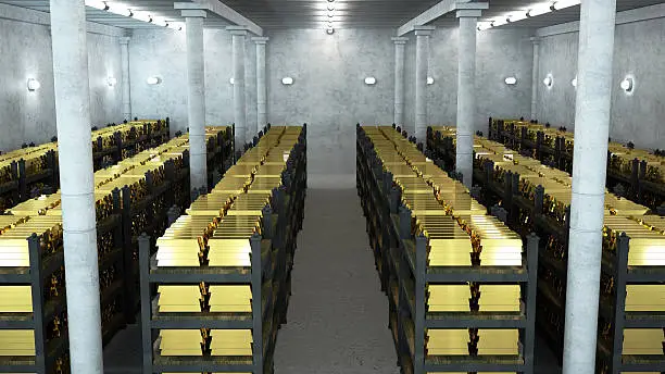 Photo of bank vault with gold bars