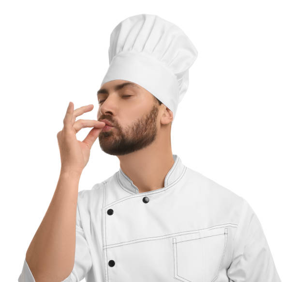istock Mature chef showing delicious gesture on white background 1786363493