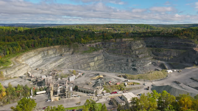 Rightward Flying Drone Shot of Quarry on Cloudy Day in Pennsylvania