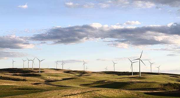istock windmill farm in beautiful landscape 178637547