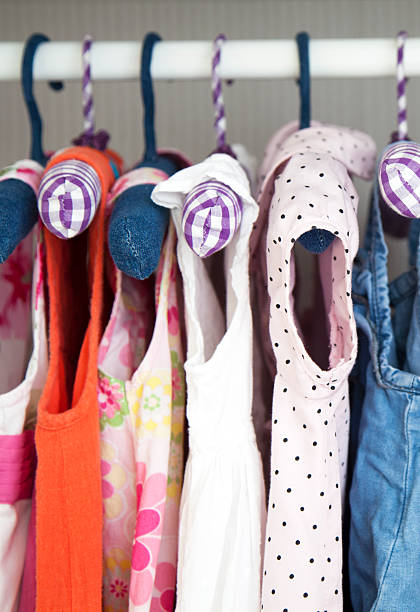 istock Pretty girls clothes on hangers 178637782
