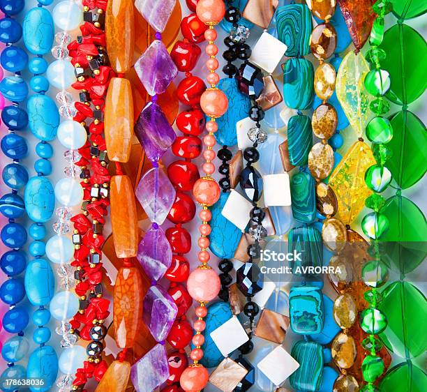 Colored Beads From Different Minerals And Stone Background Stock