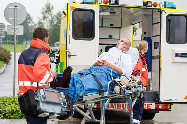 istock Oxygen mask patient treatment ambulance stretcher 178638225