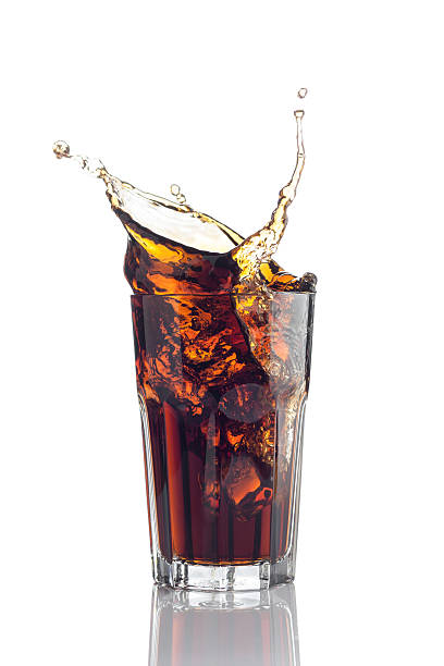 istock Glass of cola isolated on white background 178638334