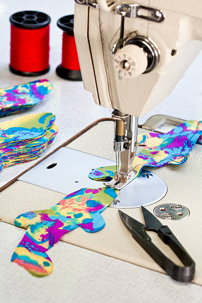 istock sewing machine and item of clothing 178638384