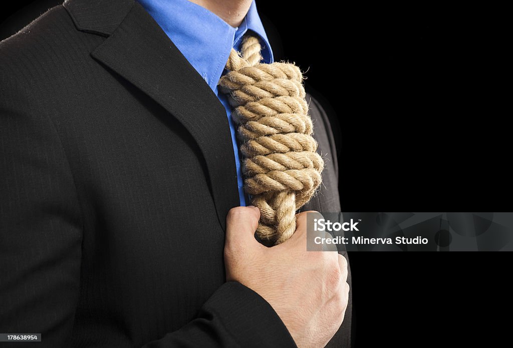 Suicide Businessman having a hanging rope in place of a collar Adult Stock Photo