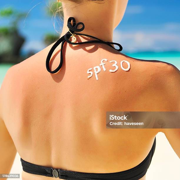 Sunscreen Lotion Stock Photo - Download Image Now - Adult, Applying, Beach