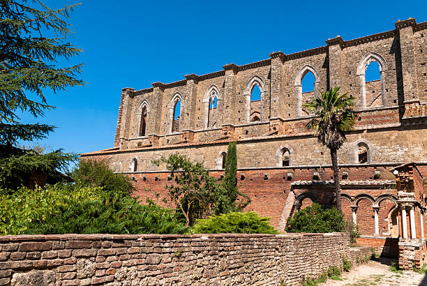 Cloister in the abbey of San Galgano, Tuscany. stock photo