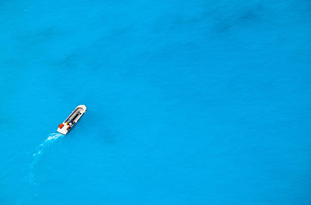 istock Motorboat ploughing blue sea 178639675